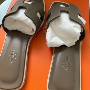 Brand new oran sandal size 37 Etoupe with dust bags，box and a copy of receipt